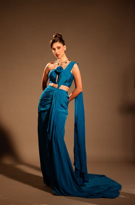 Sapphire Skies: Bright Blue Draped Saree – Anshika Tak Official