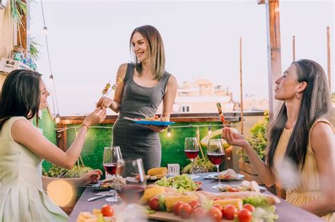 Rooftop dinner party Images - Free Download on Freepik