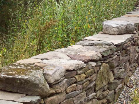 Stacked Stone Retaining Wall Ideas at Mia Stanfield blog