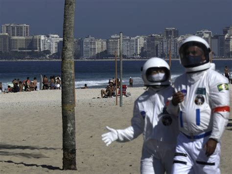 Elderly Couple Goes To Beach In 'Space Suit'