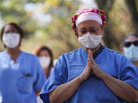 Of Loss & Life: Pictures Show How COVID-19 Is Affecting Frontline ...