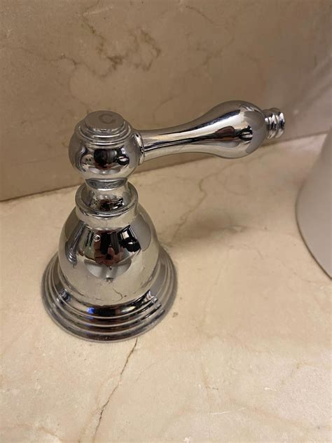 How do I remove this sink faucet handle? - Home Improvement Stack Exchange