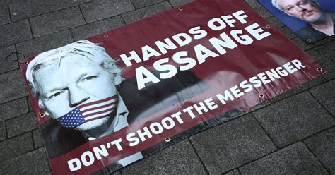 Julian Assange sentenced to 50 weeks in prison by London court for ...