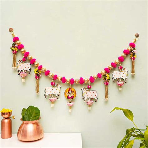 Buy Handmade Pinkpom Poms With Ganesha & Cow Pichwai Toran Online On Zwende