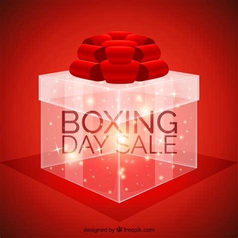 Red boxing day background with shiny gift | Free Vector