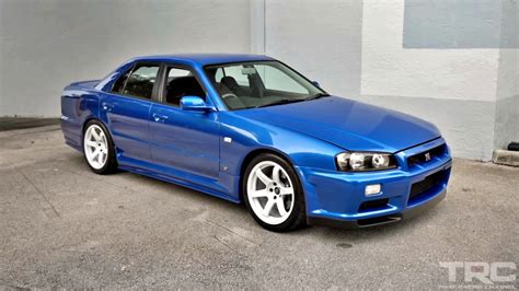 Family-Friendly Godzilla: Remembering The Ultra-Rare 4-Door R34 Nissan ...