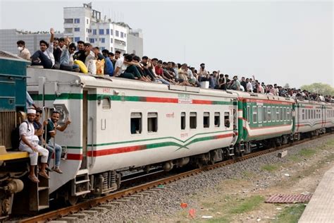Bangladesh eid rush overcrowded trains people sit on top photos gazipur ...