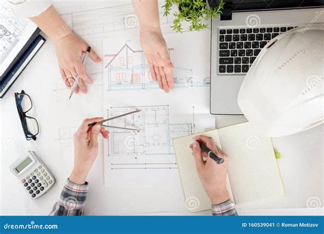 Architects Working on Blueprint, Real Estate Project. Architect ...