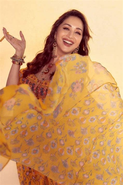 Madhuri Dixit in Yellow Border Print Cape Set