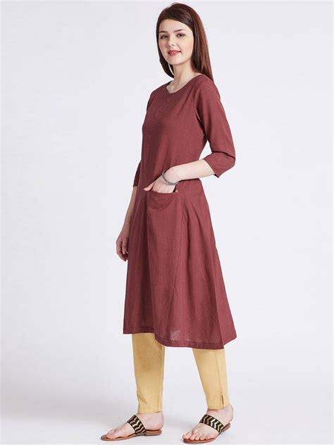Indian ethnic long kurta with front pocket in rust colour with button ...
