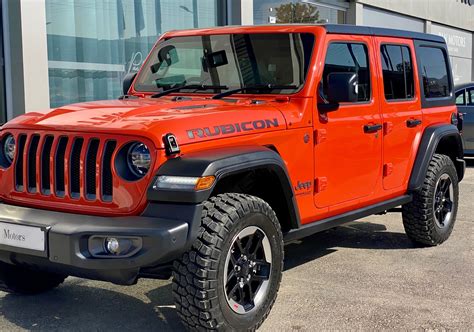 JEEP WRANGLER SAHARA IN SOLID PUNK’N ORANGE - PAN Motors