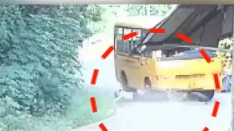 Bike rams school bus in capital city; miraculous escape for youth ...