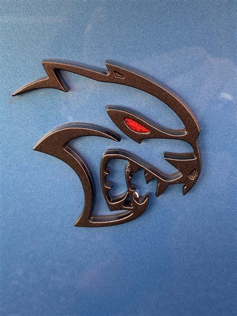 Download Dodge Hellcat Redeye Emblem Wallpaper | Wallpapers.com