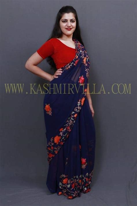 Navy blue colour saree with dense aari jaal on pallu and beautiful
