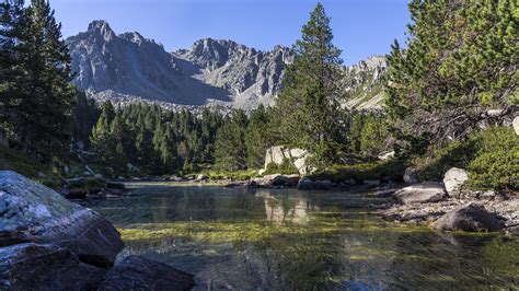 Download wallpaper 2048x1152 river, trees, mountains, landscape, stones ...