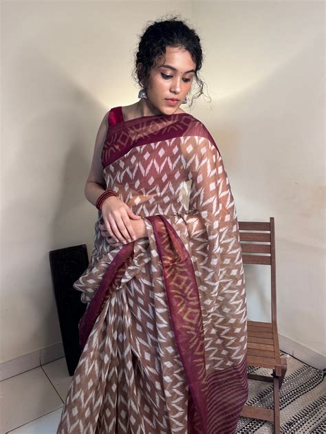 Divine Drapes Peach Ikat Design saree – Saaki