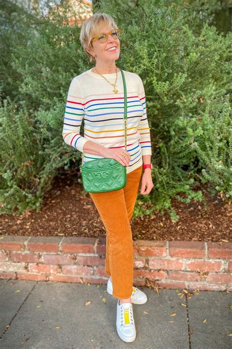 Casual outfit with a colorful striped sweater - une femme x susan blakey
