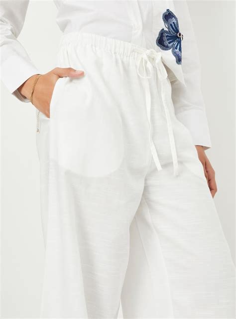 Buy Kalki x Max Women Solid Palazzos Online at just Rs. 999.0 ...