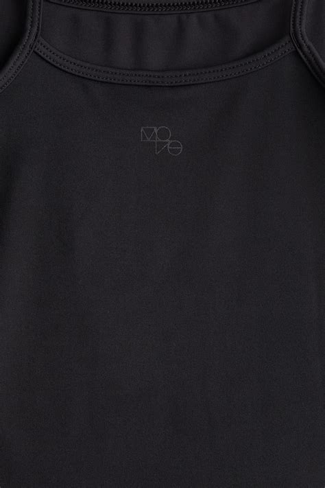 Short-leg sports unitard with DryMove™ - Black - Kids | H&M IN