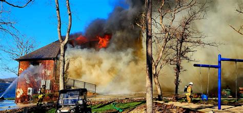 Multiple departments battle fire at Lake Ozark residence