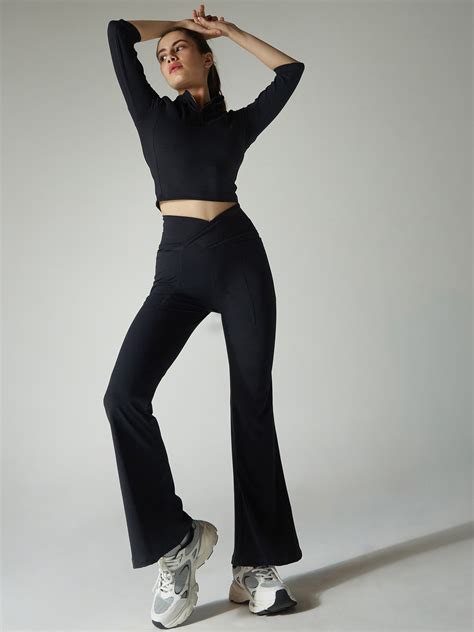 Obsidian Black Petite Hourglass Flared Leggings – CAVA Athleisure Pvt Ltd