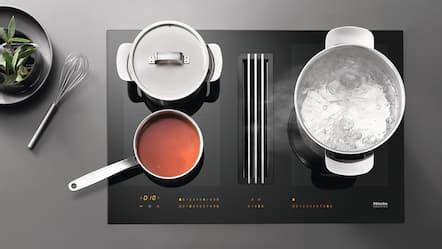 Features and user interfaces - Induction hobs with integrated extractor