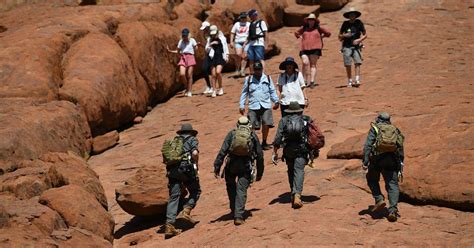 Ban on Ayers Rock in Australia: Hundreds of tourists flock to Uluru to ...