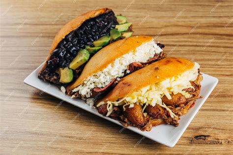 Premium Photo | Operated fried empanadas venezuelan food