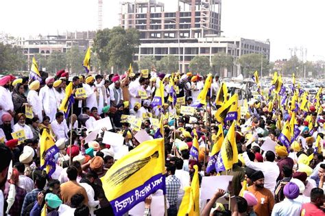 AAP supporters stage a protest against the arrest of Chief Minister ...