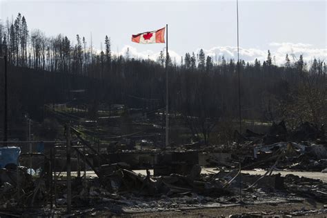 Wildfire-sparked evacuation orders lifted at all Canadian work camps ...
