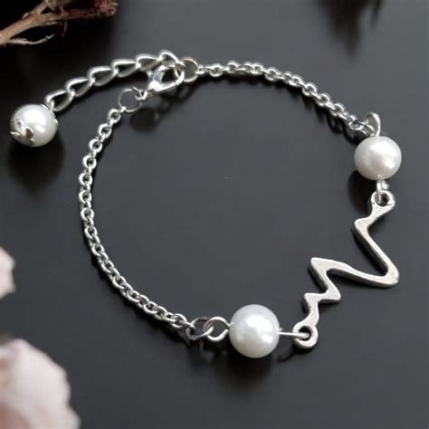 Heartbeat Silver Toned Bracelet – AashirsLifestyle