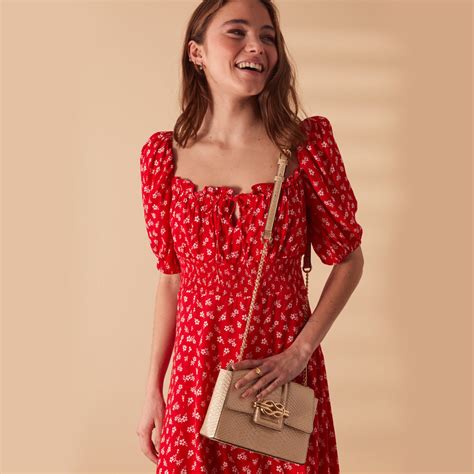 Buy Gold Snaffle Detail Croc Sling Bag - Accessorize India