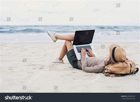 Beach Pictures with People Using Computer 的图像结果