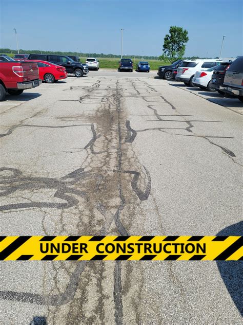 IAA Economy Parking Lot - Resolution Group Inc
