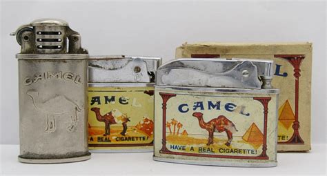 At Auction: (3) Vintage Camel Cigarette Lighters