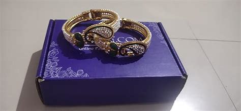 Sukkhi Glittery Pearl Gold Plated Wedding Jewellery Peacock Meenakari ...