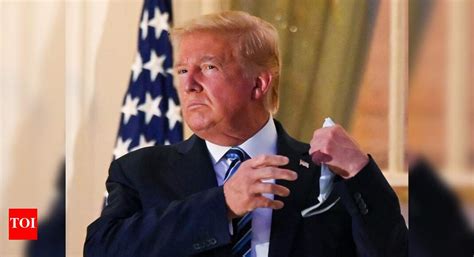 Trump faces backlash for removing mask on return to White House - Times ...