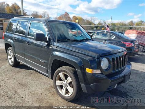 Report 1C4NJRFB9ED766079 JEEP PATRIOT 2014 Black Gasoline - price and damage history