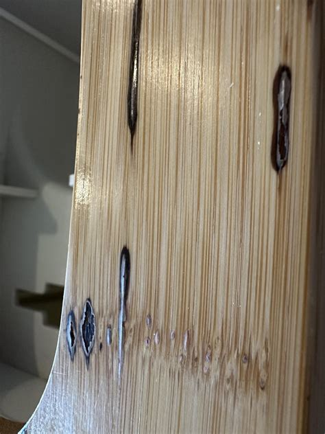 What are these brown streaks in finished bamboo grain? : r/wood