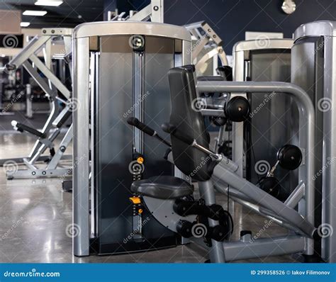 Shiny New Triceps Press Machine in Middle of Gym Stock Photo - Image of ...