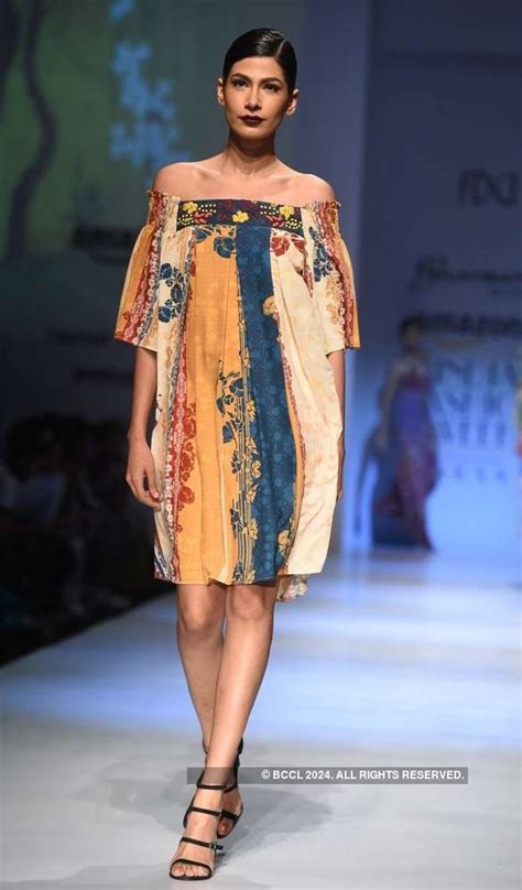 Designer Jyoti’s collection is showcased by a model as she walks the ...