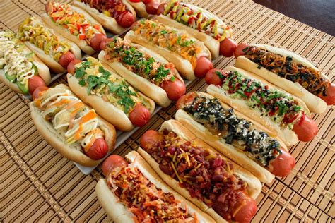 Deliciously Loaded Hot Dogs HD Wallpaper - A Feast of Flavorful Bites