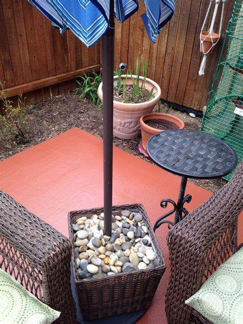 Thanks, Pinterest, for the umbrella stand idea!! Fill it mostly with ...