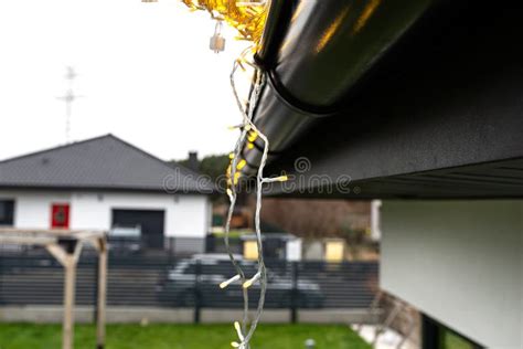 Installing Gutter Lights 的图像结果