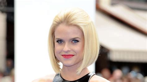 Download Alice Eve Stunning Pose in Glamorous Look Wallpaper | Wallpapers.com