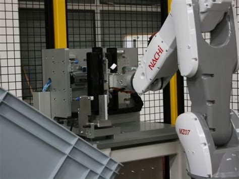 Image result for Automated Assembly Cell with Robot
