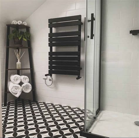 Bathroom With Black-and-White Geometric-patterned Floor Tiles - Soul & Lane