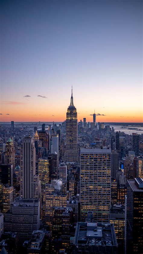 Download wallpaper 938x1668 metropolis, cityscape, skyline, buildings ...