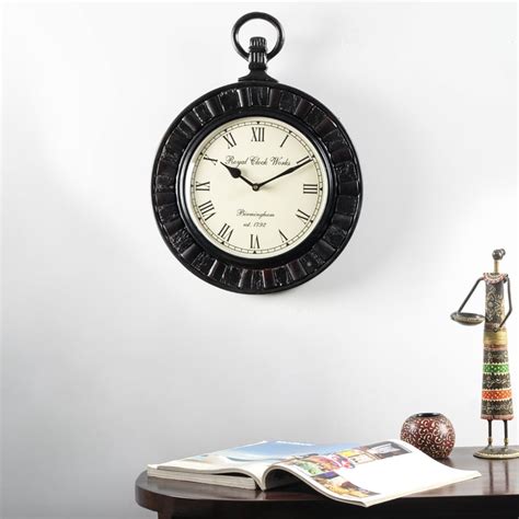 Buy VEDAS Siya Metal Wall Clock - 30cm from Vedas at just INR 4699.0