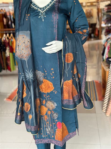 Teal blue panel printed floral modal suit set with matching straight p ...